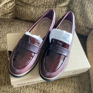 Beautiful patent leather wine color Clark loafers never used